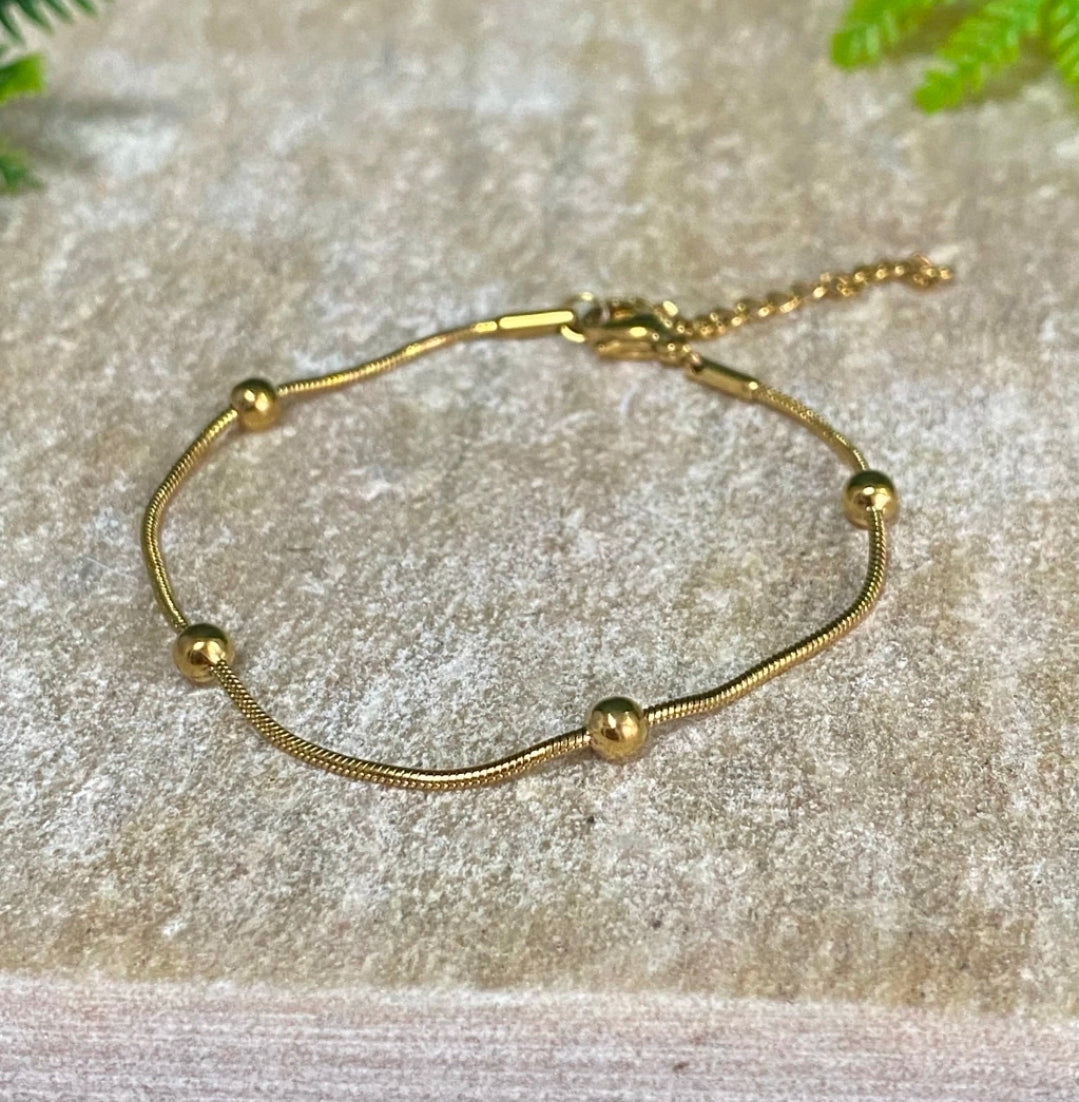 Pulseira Bolinha Dourado - Aço